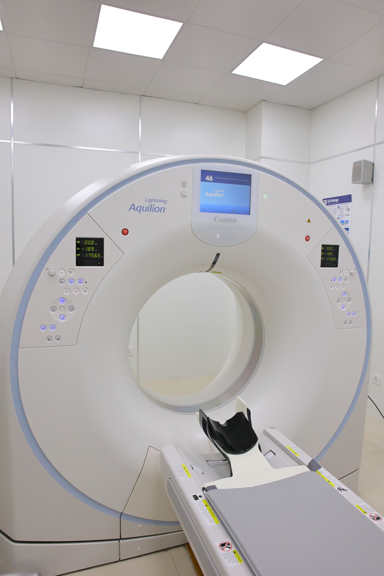 High-tech MRI machine in a hospital diagnostic room.
