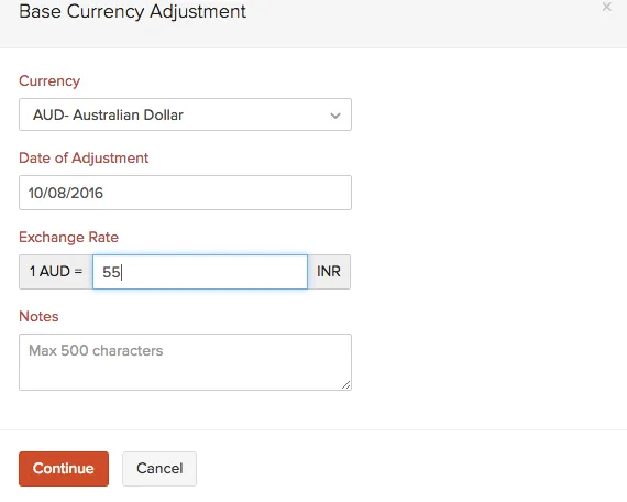 Zoho Books currency adjustment screen with live exchange rate.